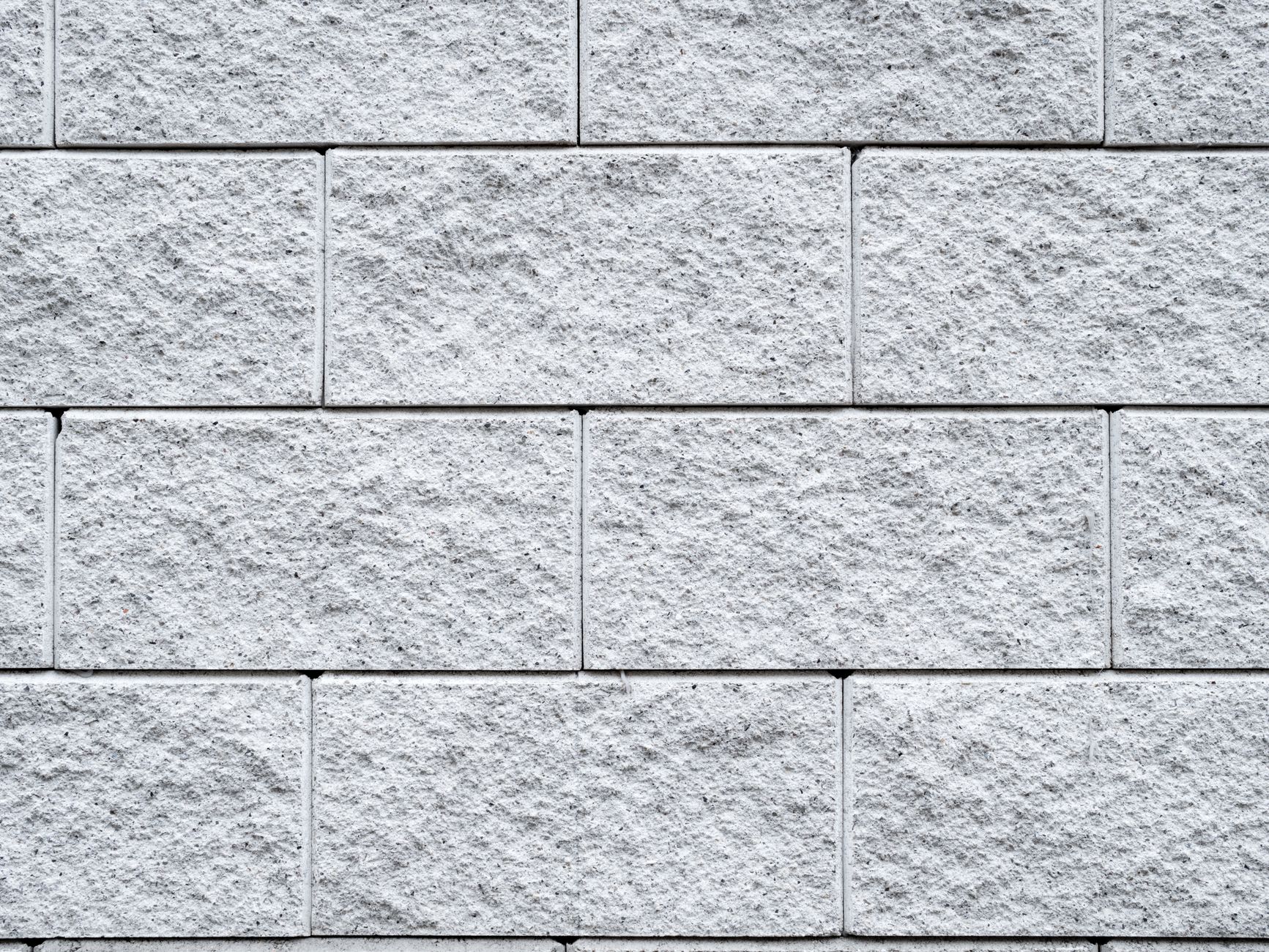 Close-up of a concrete lintel bearing on blockwork, showing correct lintel specification for a block wall opening