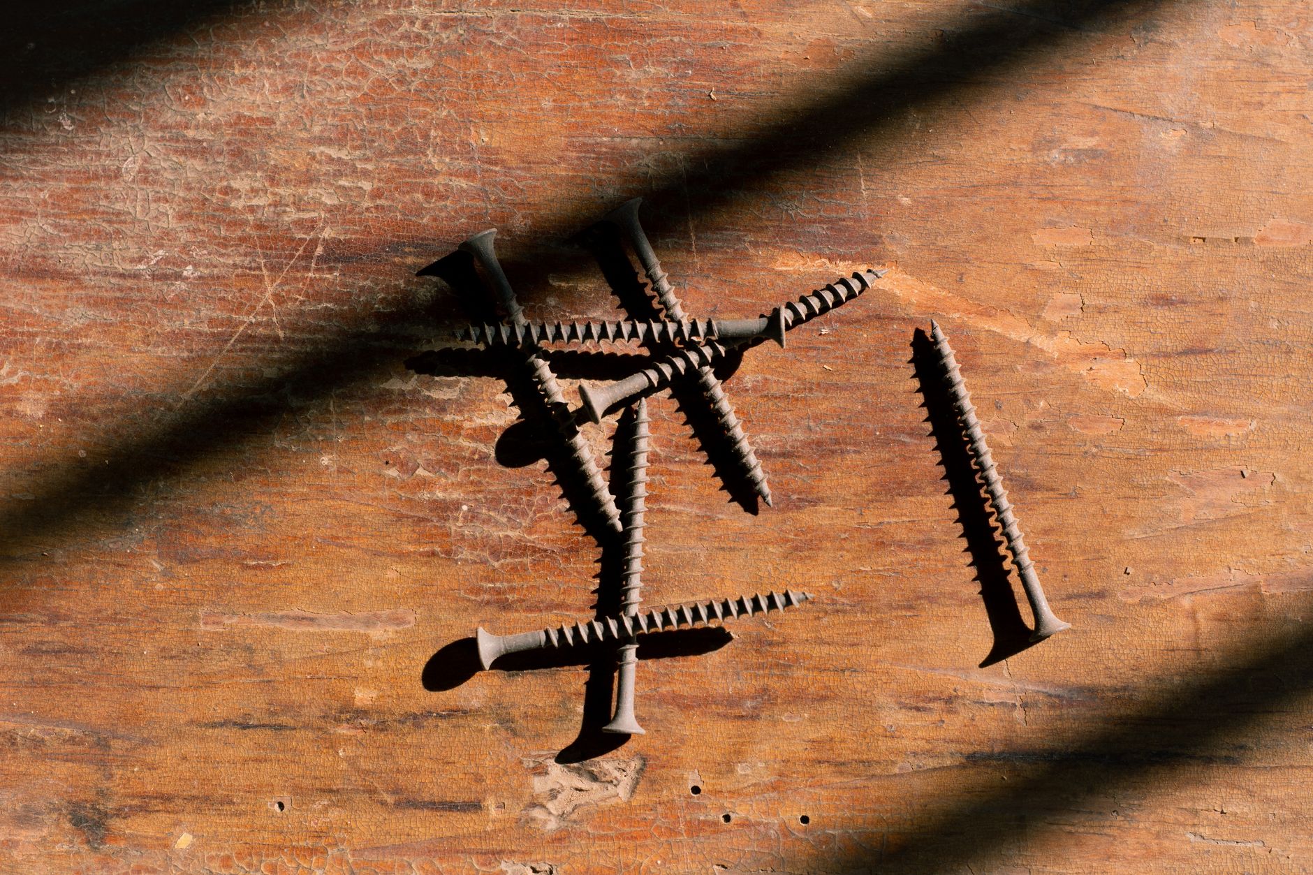 Corroded fixings on external timber showing why correct external fixings for timber and masonry UK specification matters